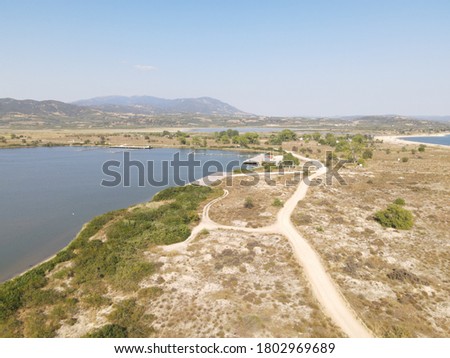 Aerial drone photo over the beach and small peninsula of the Strimonas river in North Greece, Macedonia