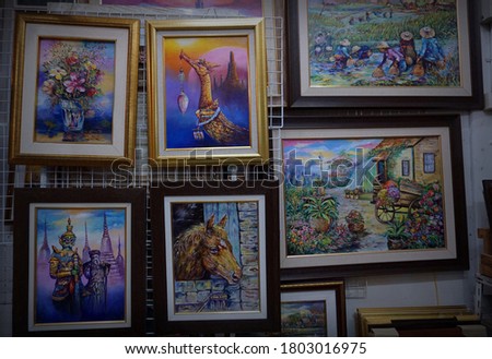 Frames and oil paintings from Thailand.                   