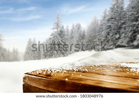 Table background of free space and winter landscape 