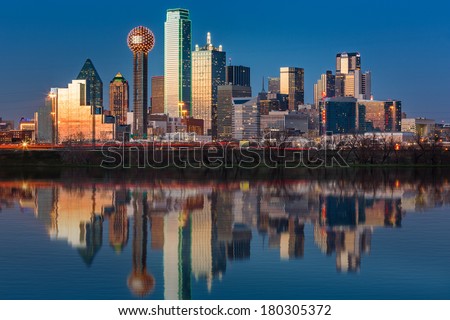 Dallas skyline reflected in Trinity River at sunset Royalty-Free Stock Photo #180305372