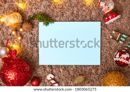 christmas frame and toys with blue leaf, flatley, copyspace