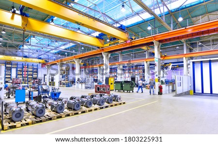 modern industrial factory for mechanical engineering - equipment and machines  Royalty-Free Stock Photo #1803225931