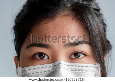 Asian woman Wearing a face mask Prevent germs and prevent the coronavirus, Concept of protection against germs and viruses.