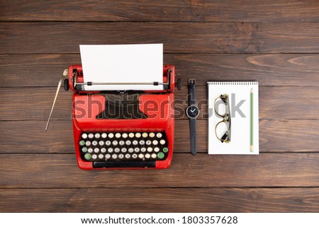 Vintage typewriter and a blank sheet of paper, Writer or journalist workplace