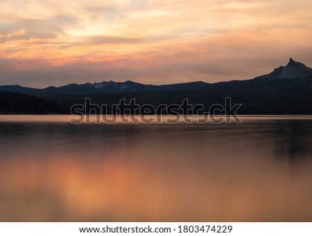 Sunrise at Diamond Lake in Oregon with a view of Mt. Thielsen.