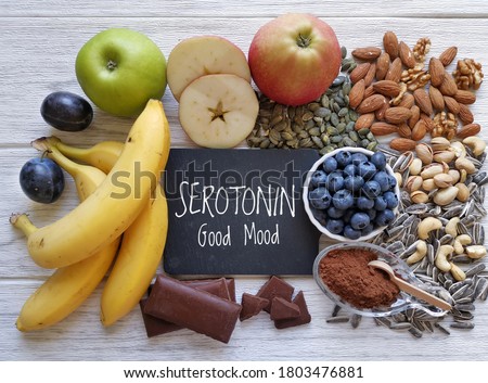 Serotonin-boosting foods. Assortment of food for good mood, happiness, better memory, and positive mind. Healthful foods that may help boost serotonin. Natural sources of serotonin, healthy diet. Royalty-Free Stock Photo #1803476881