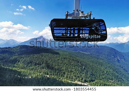 cable car cabine to the highest mountain  in germany zugspitze Royalty-Free Stock Photo #1803554455