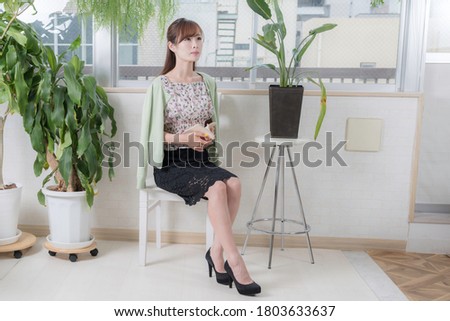 
Portrait of a woman enjoying reading by the window Royalty-Free Stock Photo #1803633637