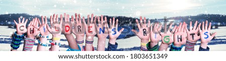 Children Hands Building Word Children Rights, Snowy Winter Background