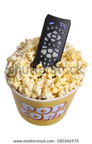 Remote control in popcorn bucket on white