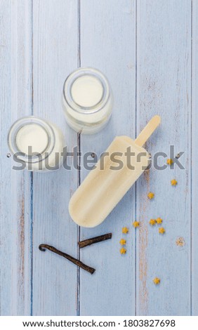 Vanilla Popsicle with Vanilla in Blue Background Rustic