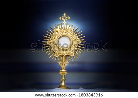 Ostensory for worship at a Catholic church ceremony - Adoration to the Blessed Sacrament - Catholic Church - Eucharistic Holy Hour Royalty-Free Stock Photo #1803843916