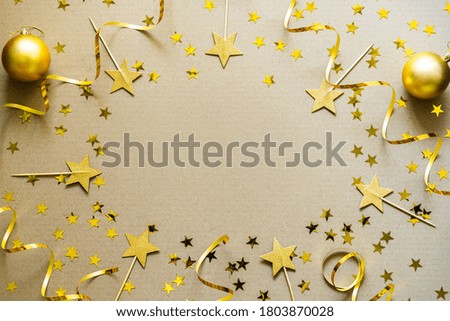 Christmas background with golden decorations, baubles, confetti. Christmas holiday celebration, winter, New Year concept.