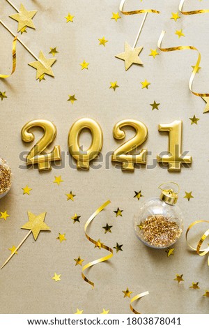 Happy New Years 2021. Christmas background with golden decorations, baubles, confetti. Christmas holiday celebration, winter, New Year concept.