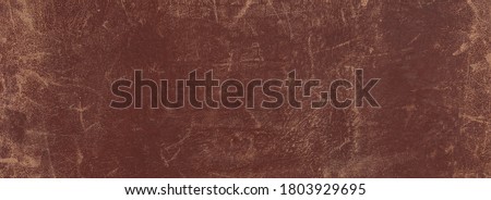 old scratched worn brown leather background and texture
