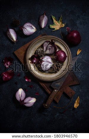 
Portrait of red onions in golden rustic plate with color enhancement and textures