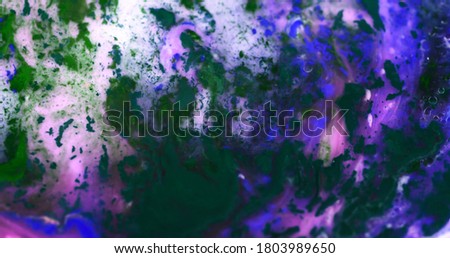 Macro Paint with Vibrant Color Palette. Raining Down. Oil Mixed with Bright Purple and Pink Dye and Paint.