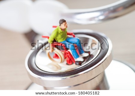 Wheelchair user and stethoscope / Wheelchair user