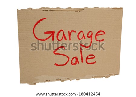 Cardboard Garage Sale sign on white background