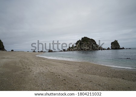 New Zealand coast line of the South Island. It is a rugged landscape with many tiny islands.