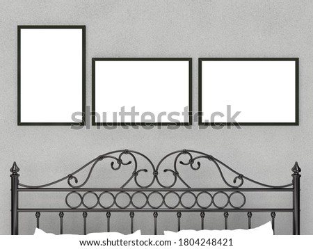 Set of 3, 2 horizontal and 1 vertical black frames hang on over antique bed. Mock-up and Template for art, design, photography, illustration and painting. Interior, Gallery, museum and exhibition.