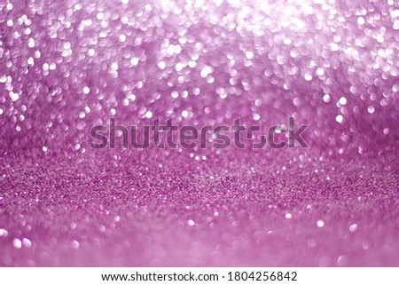 purple pink glitter light bokeh texture abstract background. Defocused