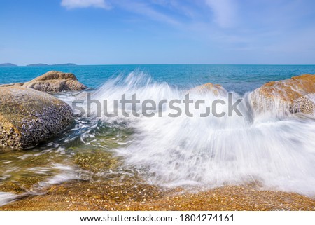 Wave on the sea and blue sky.Take picture with slow speed shutter.