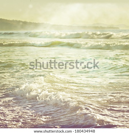 Vintage retro stylized photo of ocean waves  