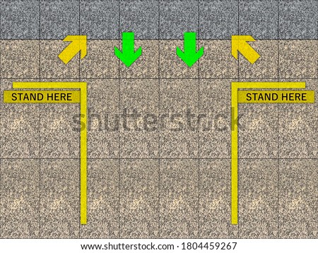 Stand here place in yellow line area place for transit at train station platform.