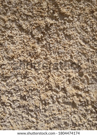 Sandstone wall structure, arbitrary masonry, close-up.