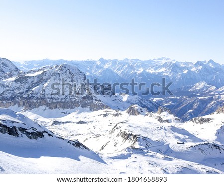 Picture of snow mountains  at italian Alps and blue sky.