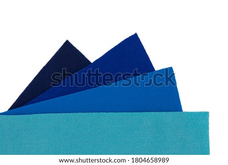 Set of blue color felt sheets isolated on white background.