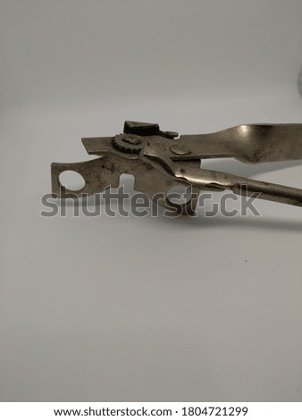 Steel can opener and light box