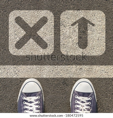 Pair of shoes standing on a road with two icon