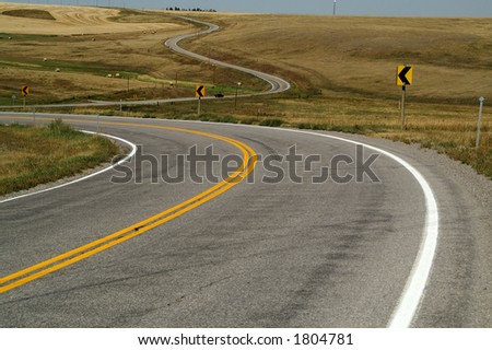Winding road with little traffic and wide open spaces
