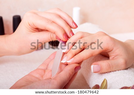 manicure and pedicure. body care, spa treatments Royalty-Free Stock Photo #180479642