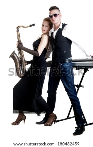 Young man and woman with musical instruments saxophone and synthesizer on a white background isolated