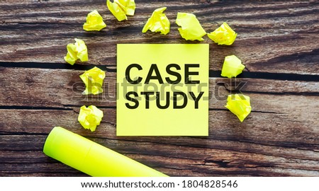CASE STUDY . Notes about CASE STUDY concept on yellow stickers on wooden background