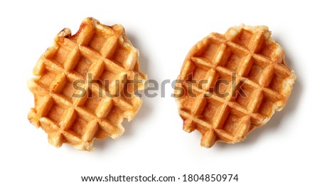 two freshly baked belgian waffles isolated on white background, top view Royalty-Free Stock Photo #1804850974