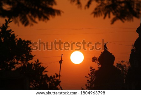 A picture clicked during sunrise in India showing temple.