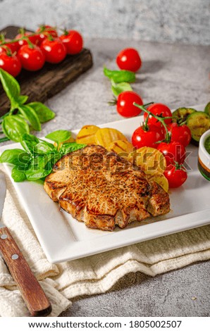 Grilled steak with herbs sauce, grilled vegetable with garlic