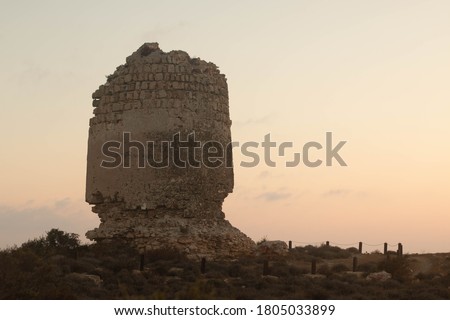 cerrillos tower in punta entinas sabinar natural area - Almeria Royalty-Free Stock Photo #1805033899