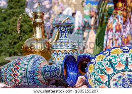 Tashkent, Uzbekistan, March 21.2018 Holiday Navruz. National traditional dishes of Uzbek and Central Asia. Traditional painted ornaments on household.