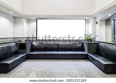 Blank advertising signs placed behind the living area at the office building	