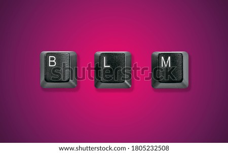 Computer keyboard keys spelling BLM, isolated on a dark purple red background