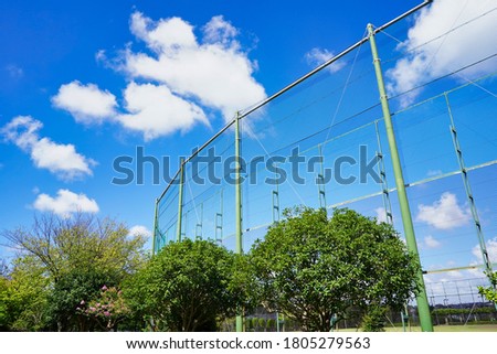  fence of baseball field in a summer day                             