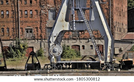 Photo with elements of a port cargo crane.