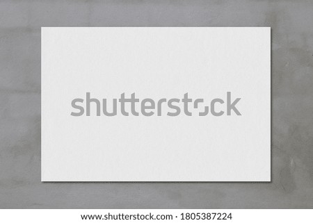 Gray art paper on a concrete background for design in your work concept.