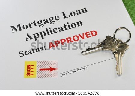 Approved Real Estate Mortgage Loan Document Ready For Signature With House Keys Royalty-Free Stock Photo #180542876