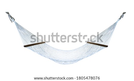 A hammock is a sling made of fabric, rope, or netting, suspended between two or more points, used for swinging, sleeping, or resting isolated on white background. This has clipping path.